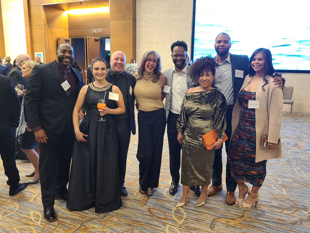 San Diego SBDC advisor Cheryl Brown with some of her clients and their families at the National Electrical Contractors Association 2022 gala.