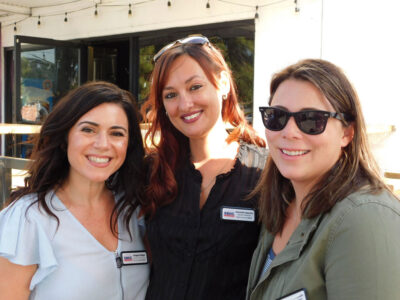 Danielle Sparks, East County SBDC Director, at a professional development event with two of her staff members